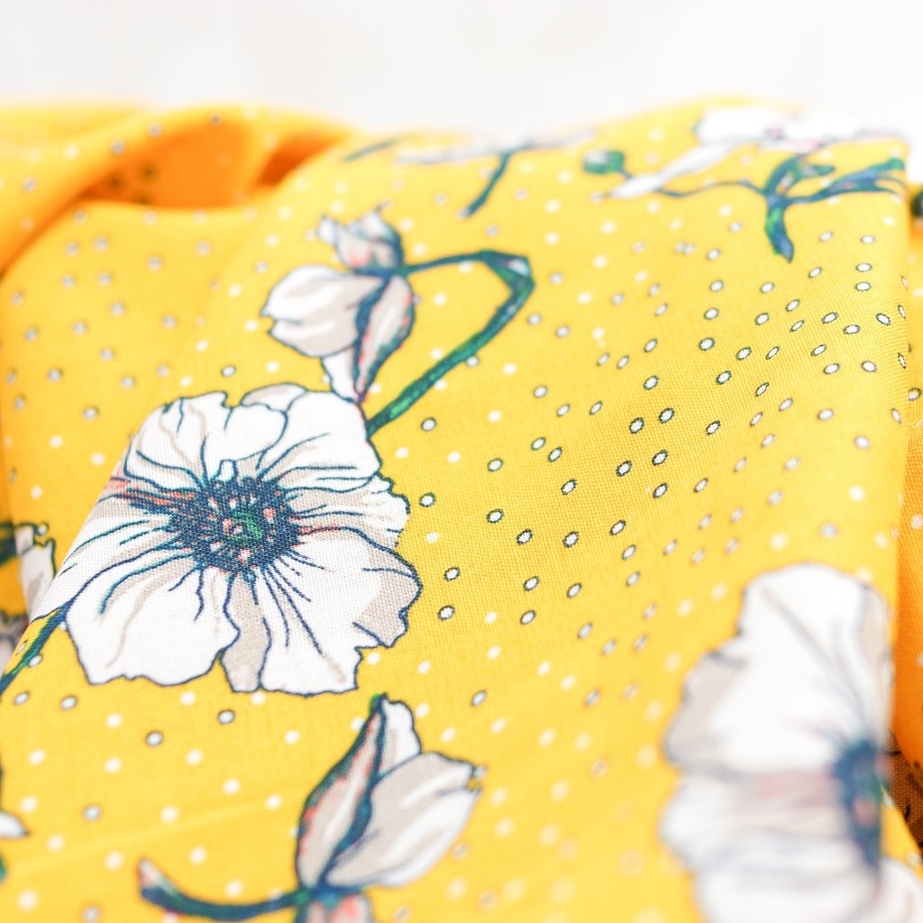 Rayon Challis fabric in poppy yellow, lightweight and soft drape for dresses and skirts