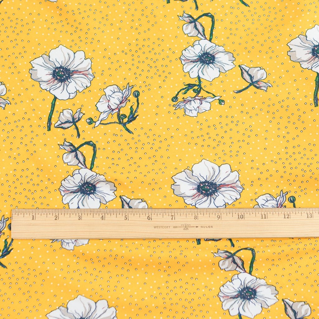 Rayon Challis fabric in poppy yellow, lightweight and soft drape for dresses and skirts