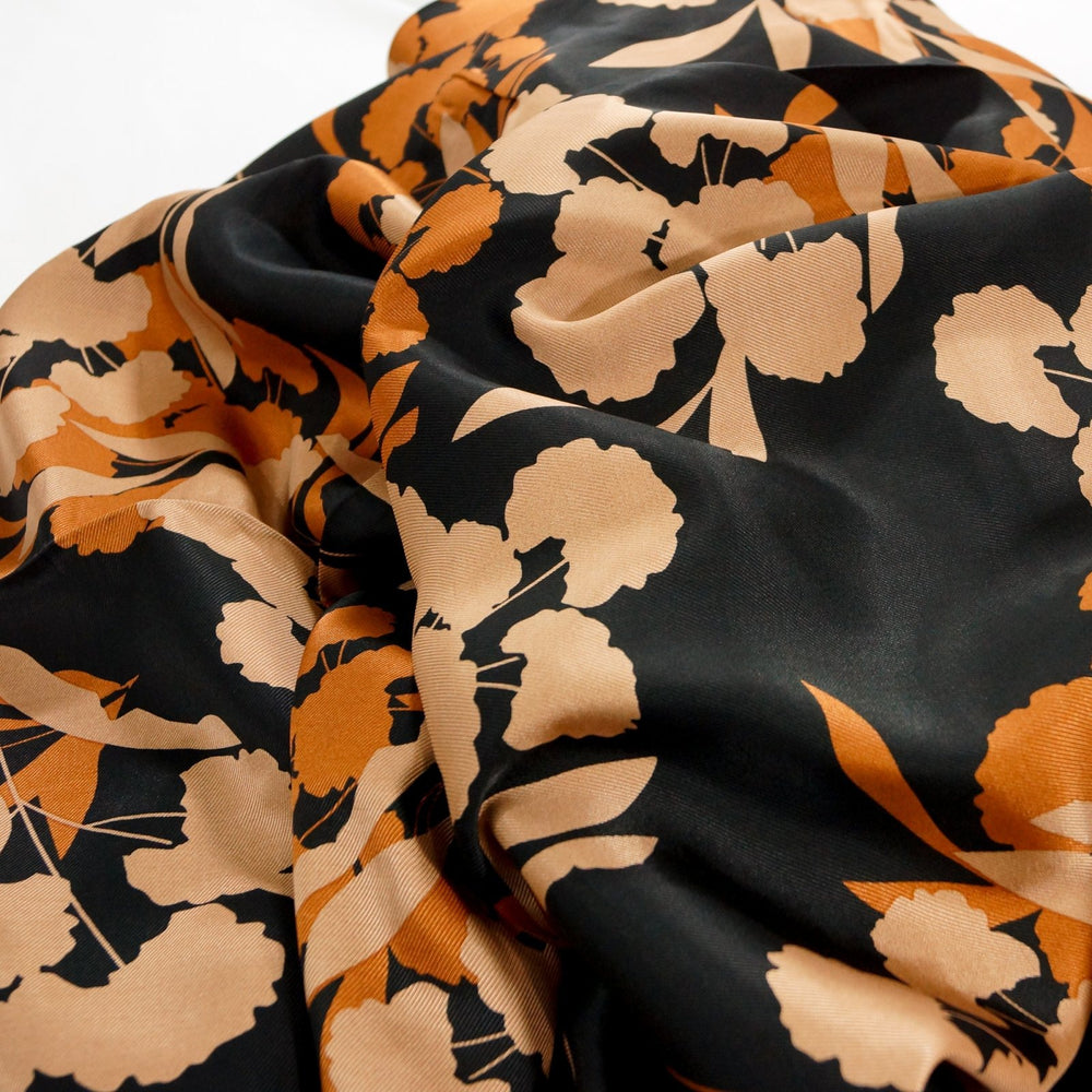 Rayon Viscose Satin Twill Sunset Floral fabric in glossy satin finish with sunset-inspired floral pattern, 58-inch wide