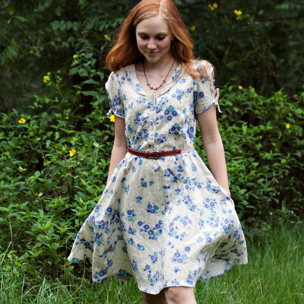 Sew Liberated Clara Dress sewing pattern with shirtwaist style, keyhole sleeves, elastic waist, inseam pockets, and full twirly skirt design