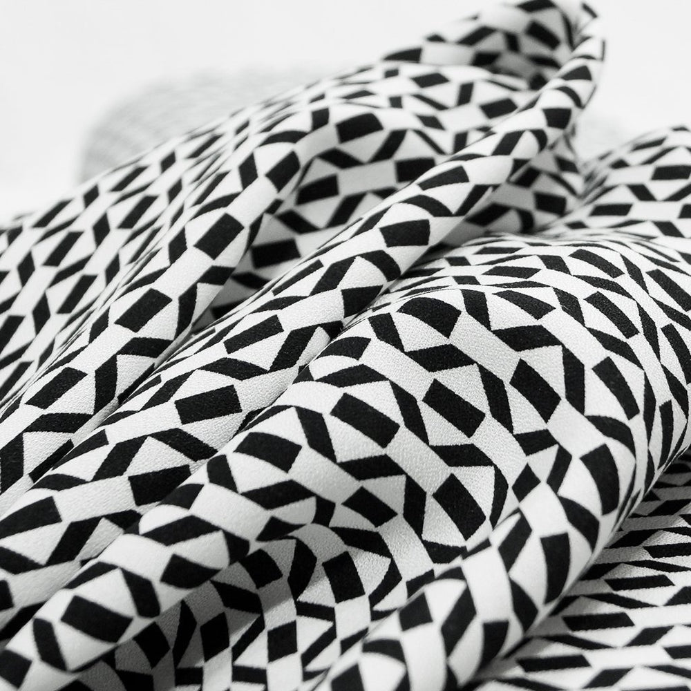 Viscose Crepe fabric in black and white geometric pattern – OEKO TEX certified sustainable deadstock textile
