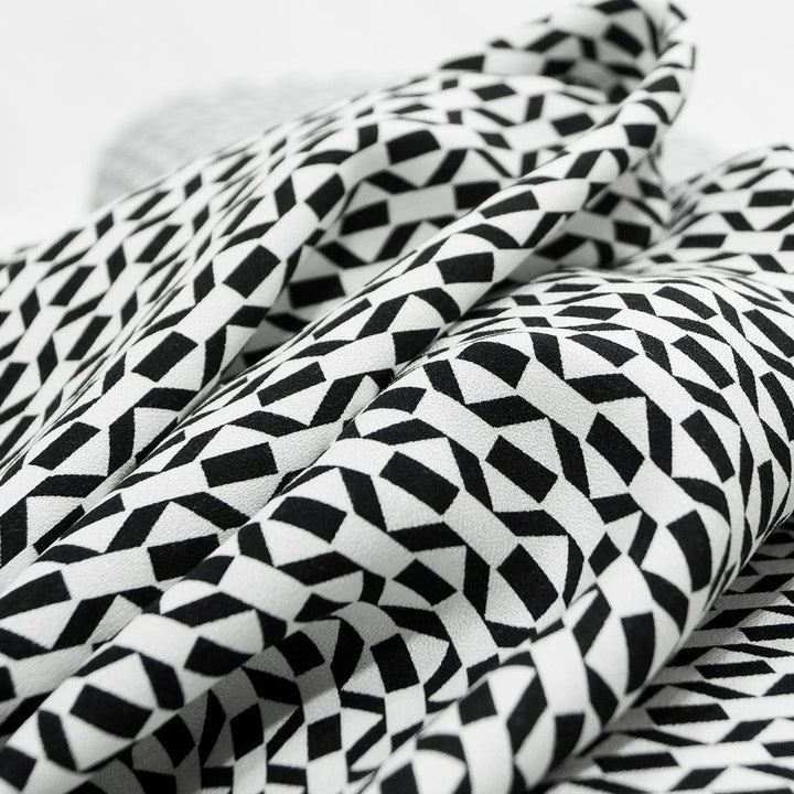 Viscose Crepe fabric in black and white geometric pattern – OEKO TEX certified sustainable deadstock textile