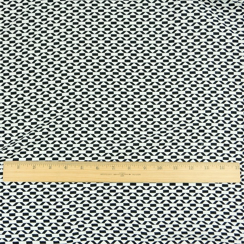 Viscose Crepe fabric in black and white geometric pattern – OEKO TEX certified sustainable deadstock textile