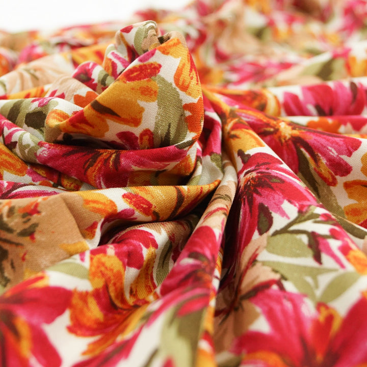 Rayon Poplin fabric in Wine & Tangerine Floral pattern, 100% rayon challis, lightweight and flowing, ideal for dresses and blouses.