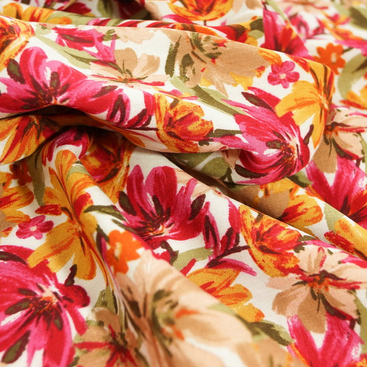 Rayon Poplin fabric in Wine & Tangerine Floral pattern, 100% rayon challis, lightweight and flowing, ideal for dresses and blouses.