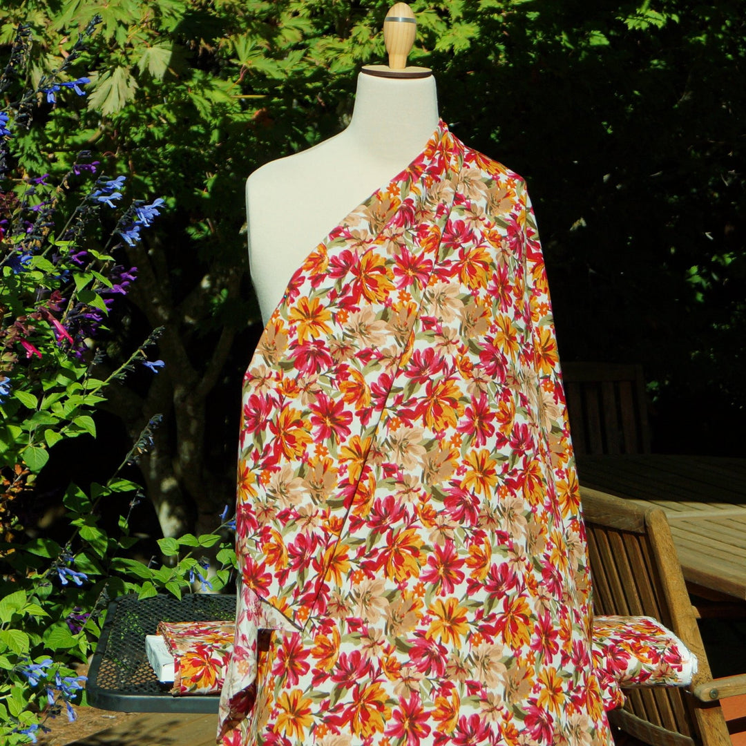 Rayon Poplin fabric in Wine & Tangerine Floral pattern, 100% rayon challis, lightweight and flowing, ideal for dresses and blouses.